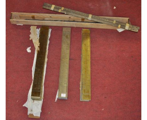 A collection of large brass thermometer scales, each approx 56cm, together with some others