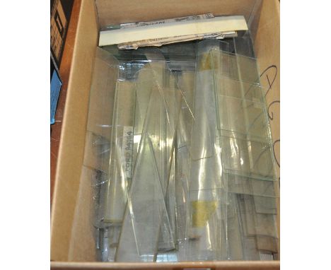 A selection of glass for thermometer cases to include bowed, square, and rectangle examples