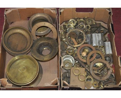 Two boxes containing assorted brass barometer rings, aneroid cases, ships barometer case (only), etc