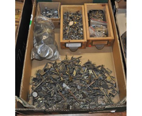 Assorted brass and metal barometer components to include collets, bolt knobs and bars, portable screws etc