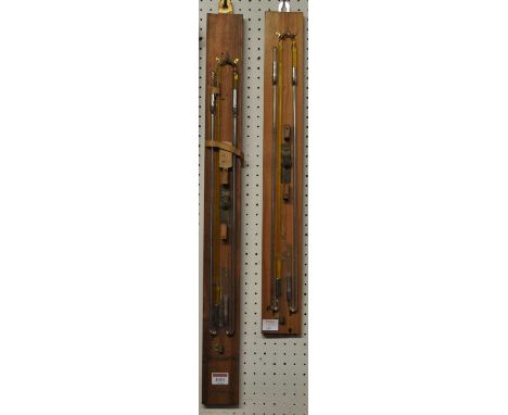 A mounted barometer tube, with spindle, pulley and weights, 57cm (excluding backboard); together with one other very similar 