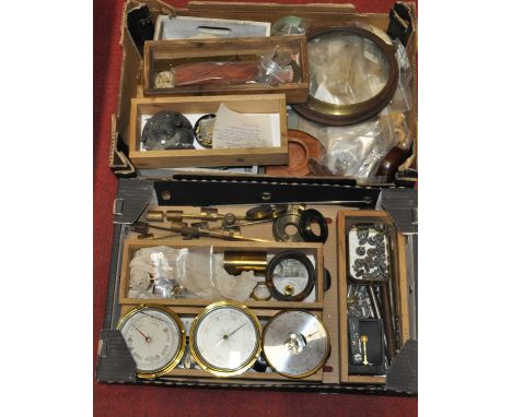 Four boxes of assorted barometer parts and components to include aneroid barometer cases and movements, glass weights, brass 