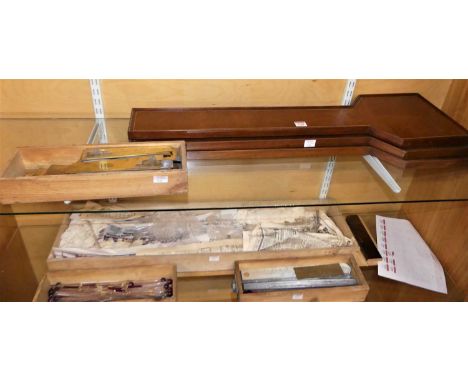 Three Knie mahogany barometer frames, together with a collection of scales, tubes, thermometer scales and tubes etc 