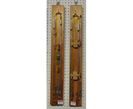 A mounted barometer tube, with spindle, pulley and weights, 57cm (excluding backboard); together with one other very similar 