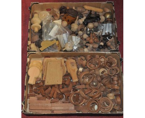 A selection of wooden, principally mahogany, barometer components to include rings, finials, etc