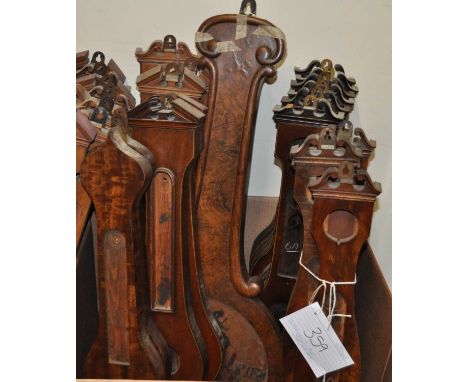 A selection of Victorian and later wheel barometer cases, to include one large pointed topped example, some of architectural 