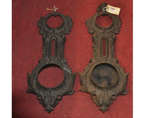 A pair of Victorian cast iron three-dial barometer cases, 65cm 