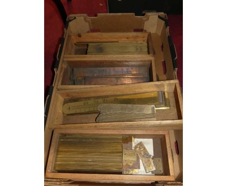 A large collection of brass and aluminium thermometer scales 