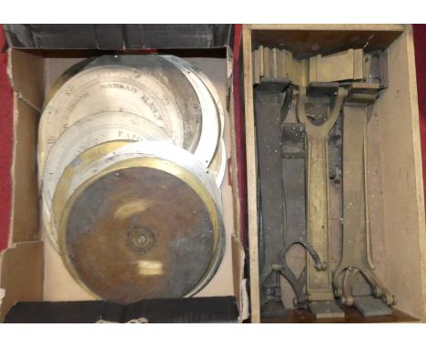 A collection of various brass and engraved metal barometer main dials, 8", together with various brass gimbal arms