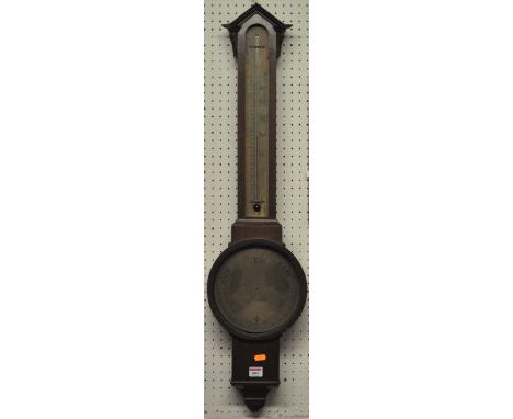 A mahogany stick barometer, with unsigned brass circular main dial and unsigned thermometer dial, the whole of architectural 