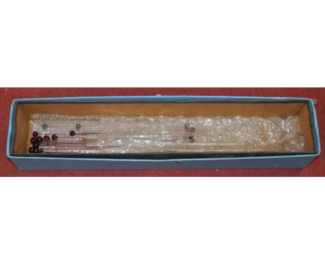 A collection of long scale thermometer tubes (in two boxes)