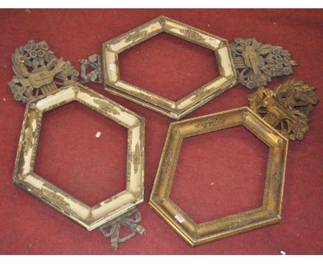 Three French carved gilt wood barometer frames and glass, each of hexagonal form, with floral carved pediment, gross height 9