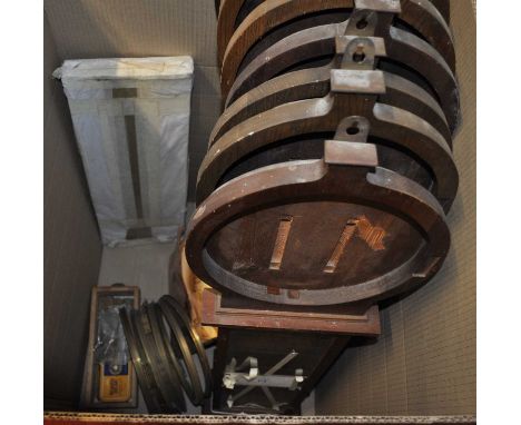 Eight various oak polytechnic barometer cases; together with a selection of paper dials, brass bezels, polytechnic glasses an
