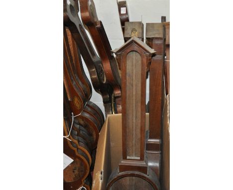 Three various onion topped two-dial wheel barometers (incomplete); together with three walnut barometer cases (only), each of