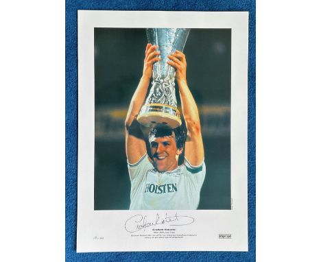 Graham Roberts signed 22x16 colour print 1984 UEFA Cup Final Graham Roberts lifts the UEFA Cup following Tottenham Hotspurs v