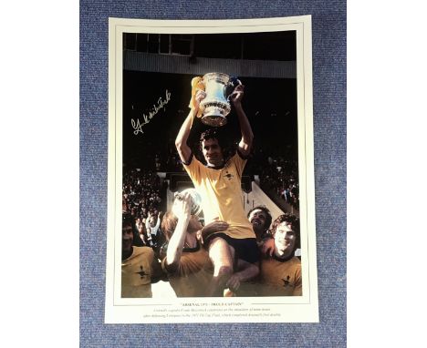 Frank McLintock signed Arsenal 1971 Proud Captain 16x12 inch colour print. Arsenal's Captain Frank McLintock celebrates on th