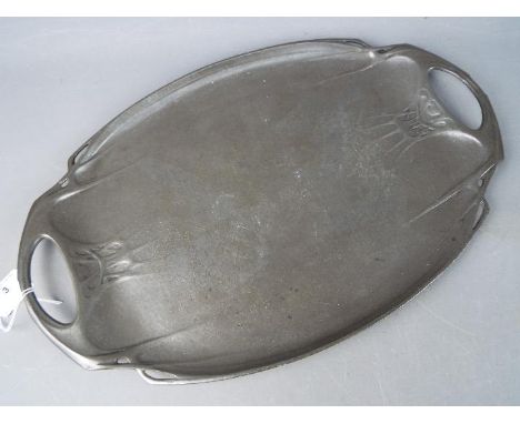 An Art Nouveau pewter tray by Hutton of Sheffield, stamped to the base '1105', possibly for Liberty, approximately 48 cm x 31