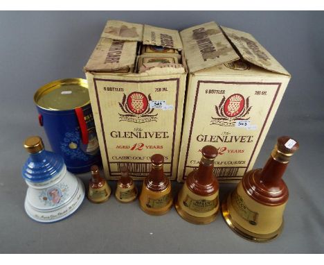 A boxed 75 cl Bells Old Scotch Whisky decanter, Queen Mother 90th Birthday commemorative, a 26⅔ floz decanter, a 13⅓ floz, on