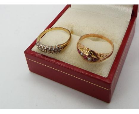 A 9ct gold, garnet and pearl ring size L and a further stone set 9ct gold ring, size I+½, approximately 2.6 grams all in.