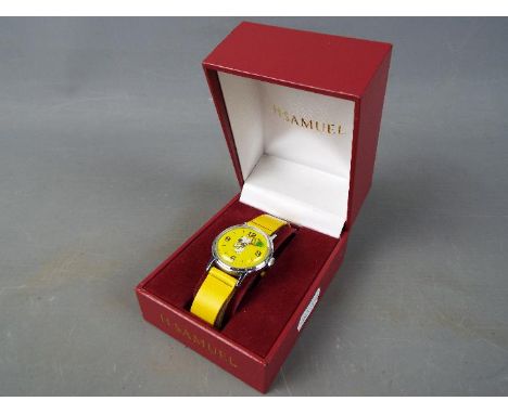 A Timex 'Snoopy Tennis' wristwatch with yellow dial and strap, case diameter approximately 3 cm.Condition Report: Watch runni