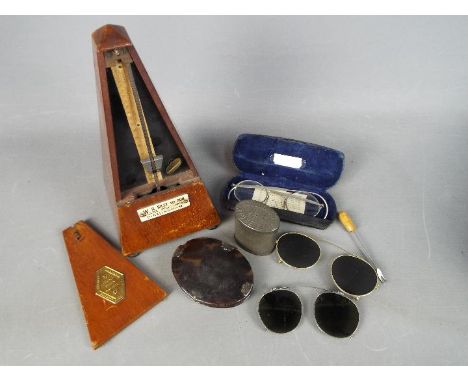Lot to include a Maelzel Metronome, folding magnifying glass and other.