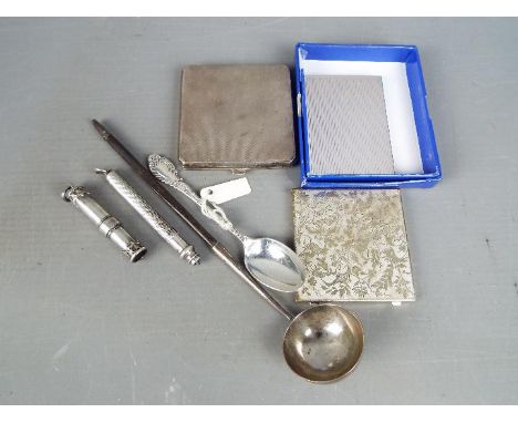 Lot to include a Georgian toddy ladle (indistinctly marked to the bowl), a silver powder compact with engine turned decoratio
