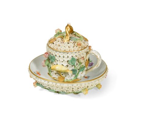 A Meissen schneeballen chocolate cup, cover and saucer, 19th century,encrusted with white flowerheads, roses and a canary, wi