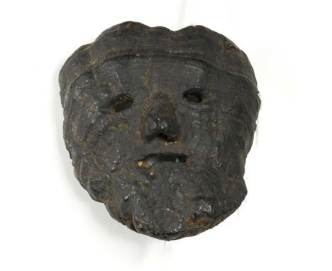 A carved tree fungus protective spirit mask, Central Nepal, early 20th century,of primitive, naturalistic form with pierced e