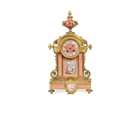 A French ormolu and Rose Pompadour porcelain mantel clock, 19th century,the gilt urn above 9.5cm dial, bell striking drum mov