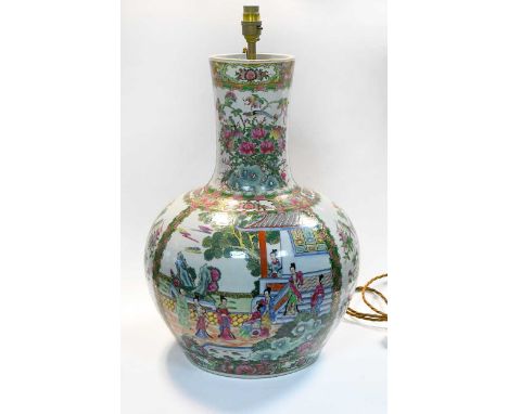 A Chinese large famille rose porcelain vase, modern,decorated in Cantonese style with numerous Manchu figures in panels, in c