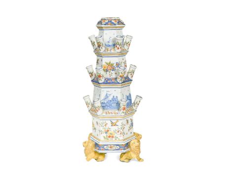 A Cantagalli tulip vase,the tapering hexagonal body decorated with alternating panels of flowers and shipping scenes, divided