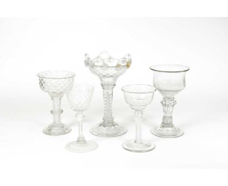 A George II air twist sweetmeat glass, circa 1750-60,the honeycomb moulded ogee bowl with five (originally ten or more) arche