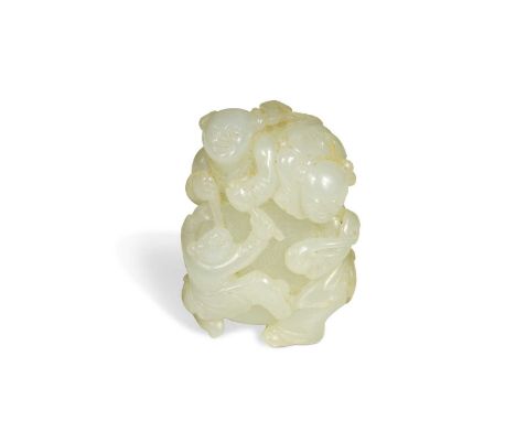 A Chinese light celadon jade carving of three boys and drum, Qing Dynasty 18th/19th century,the three lively boys clambering 