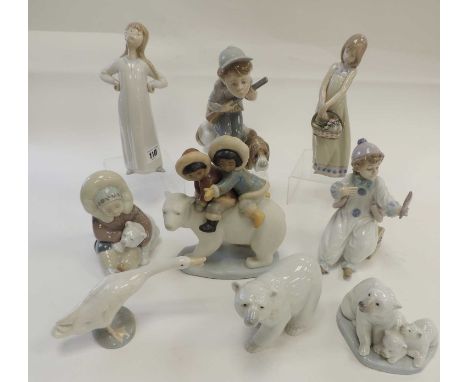 GROUP OF NINE LLADRÓ CERAMIC ORNAMENTS, including 'Eskimo Riders'Provenance: private collection Flintshire