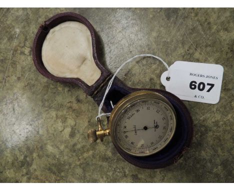 ELLIOTT BROS., LONDON BRASS POCKET BAROMETER, with fitted caseProvenance: private collection Cheshire