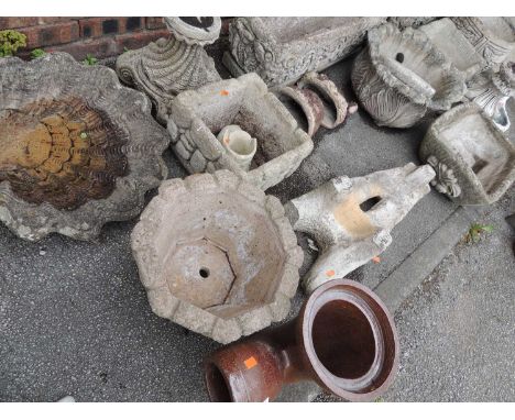 GARDEN ORNAMENTS, including reconstituted stone jardinieres, urns, scallop form bird bath, garden wheelbarrow, etc.Provenance