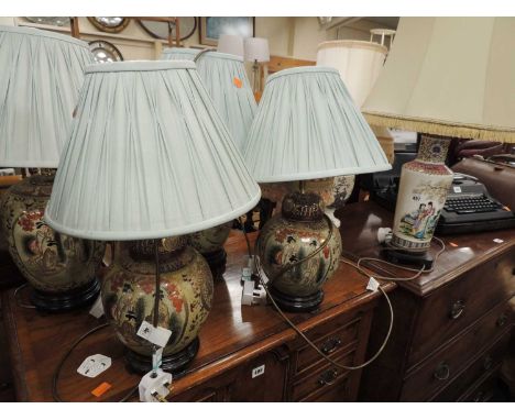 FIVE ORIENTAL CERAMIC TABLE LAMPS, and two further pottery table lamps (7)