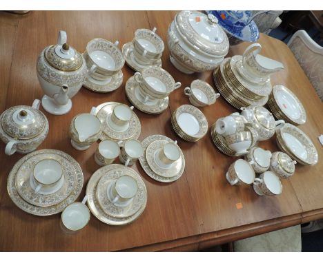 EXTENSIVE WEDGWOOD CHINA TEA, COFFEE & DINNER SERVICE, Gold Florentine pattern, approx. 94 piecesProvenance: private collecti