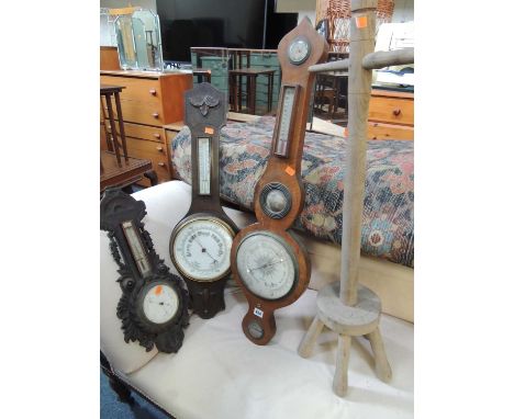 VICTORIAN WALNUT WHEEL BAROMETER by Lockwood of Preston, two Victorian oak cased aneroid barometers, and a Victorian elm wash