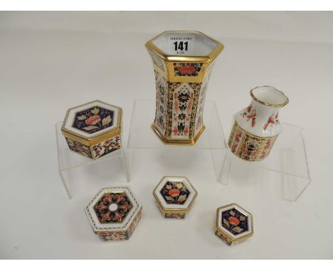 GROUP OF ROYAL CROWN DERBY IMARI SMALL ORNAMENTS, including a hexagonal vase, and a graduated set of four trinket boxesProven