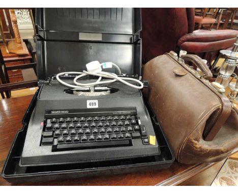 VINTAGE LEATHER GLADSTONE BAG, and a Silver Reed electric typewriter (2)