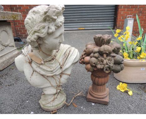 RECONSTITUTED STONE BUST OF APOLLO, 76cms (h), and terracotta coloured reconstituted stone garden finial, 56cms (h) (2)Proven