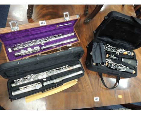 CASED ARTEMI CLARINET, Chinese lark cased flute, and an Elkhart cased flute (3)Provenance: private collection Cheshire