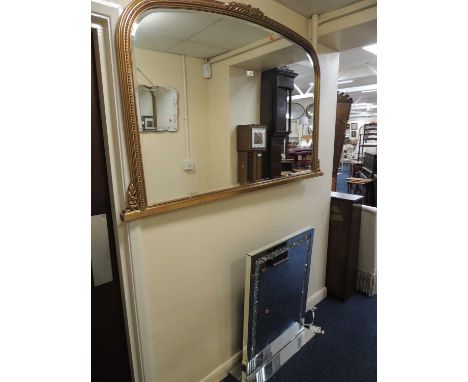 MODERN GILT FRAMED BEVEL GLASS OVERMANTEL MIRROR, in the Victorian style, 92 x 140cms, and a modern illuminated fire standPro