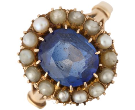 An early 20th century blue paste and pearl cluster ring, apparently unmarked, setting height 14.2mm, size N, 4gA few pearls h