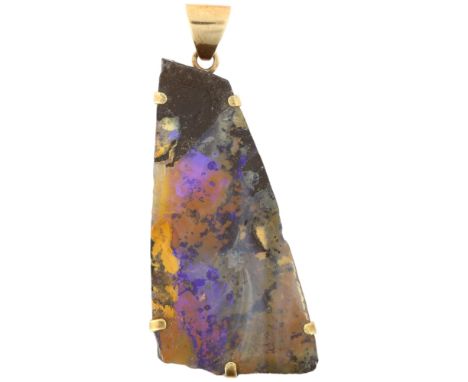 A large boulder opal drop pendant, unmarked Continental gold frame, 60.8mm, 19.1gOpal has several natural surface chips and a