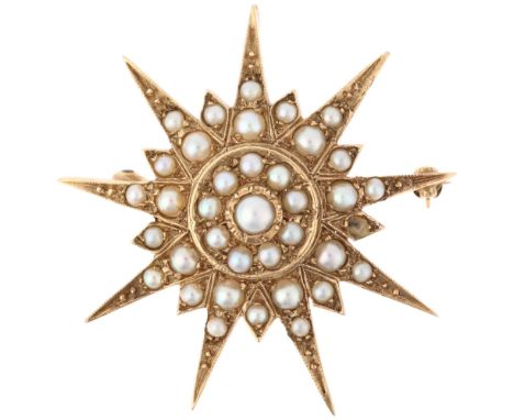 A large split pearl 9-ray starburst brooch/pendant, unmarked yellow metal closed-back settings, brooch diameter 42.1mm, 12.8g