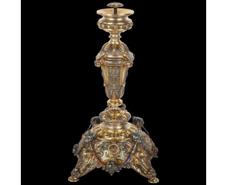 An Austrian 800 silver-gilt Renaissance Revival tazza base, ornate repousse foliate and fruit swag decoration, with lion head