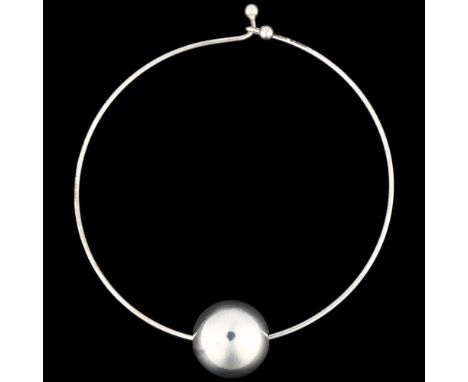 A Danish modernist geometric sphere neck torque, apparently unmarked, pendant 29.6mm, internal circumference approx 38cm, 28.
