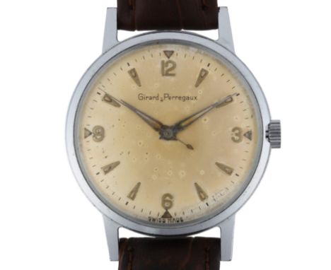 GIRARD-PERREGAUX - a stainless steel mechanical wristwatch, circa 1970s, silvered dial with applied gilt quarterly Arabic and